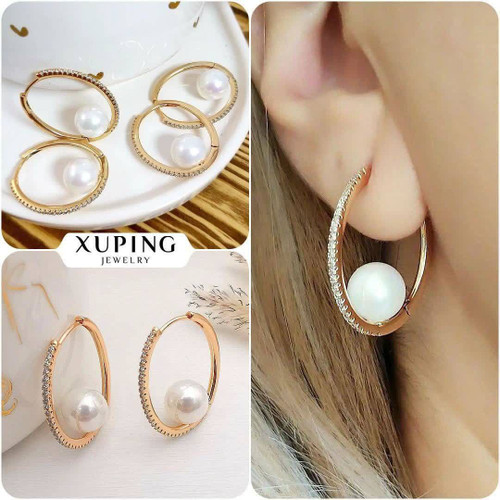 #گوشواره ژوپینگ ✨طراحی خاصش با مروارید مجذوب تر شده 🥰✨ 🔸 برند:ژوپینگ 🔸 رنگ:طلایی با آبکاری طلا 18 🔸 ارتفاع:2.5 سانت همکاری ۳۹۹۰۰۰